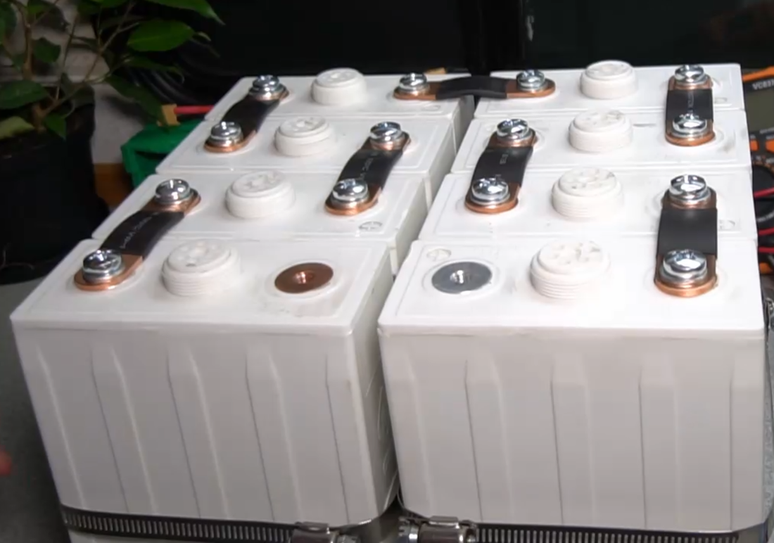 Two (2) 12V battery groups connected in series to get 24V. 